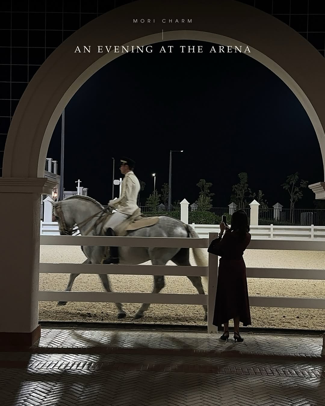 Rider at the arena at night